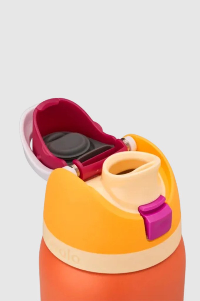 Close-up of the Owala SmoothSip Slider lid featuring a sliding mechanism and a built-in straw opening, with bold colors and ergonomic design.